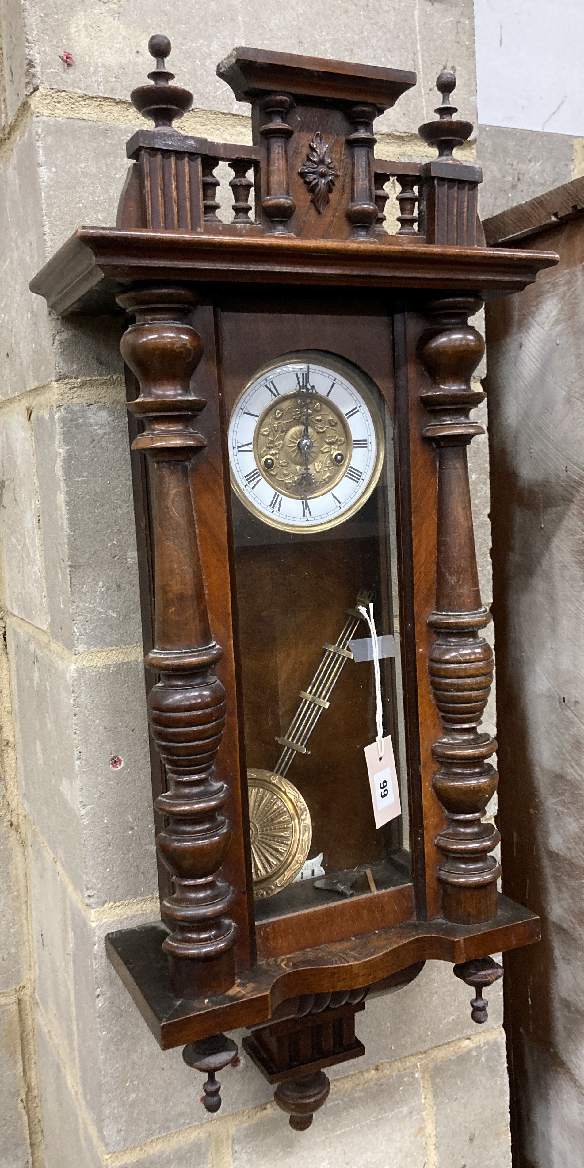 A 19th century Vienna type wall clock with musical chime, height 84cm